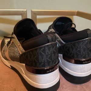 Silver sparkle and black MK wedge trainers